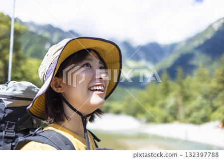 Cute woman hiking Cute woman hiking 132397788