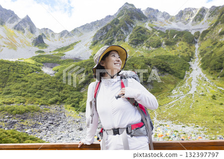 Woman climbing the Japanese Alps 132397797