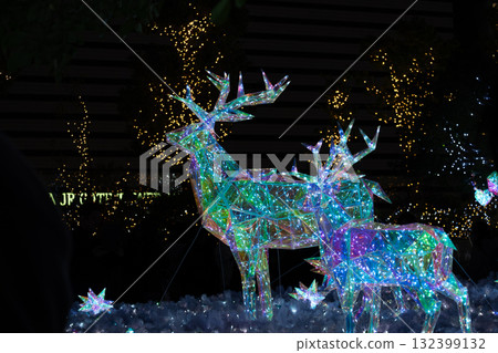 Brightly colored reindeer illuminations 132399132