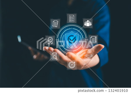 Businesswoman presents project management concept focused on quality assurance and control, featuring ISO standard guarantee marked by tick sign of approval to ensure everything is correct, certified. 132401910