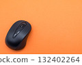 Mouse on an orange background 132402264