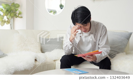 Asian man checking a collection notice 132403649
