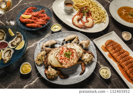 mixed traditional portuguese seafood meal on indoors lisbon restaurant table in portugal 132403952