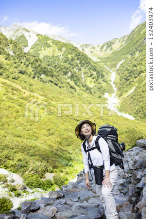 Woman hiking Woman hiking 132403974