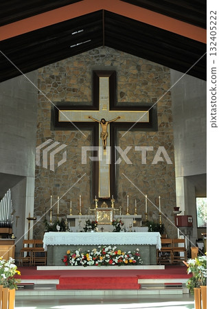 Church with a large cross on the wall Church with a large cross on the wall 132405222