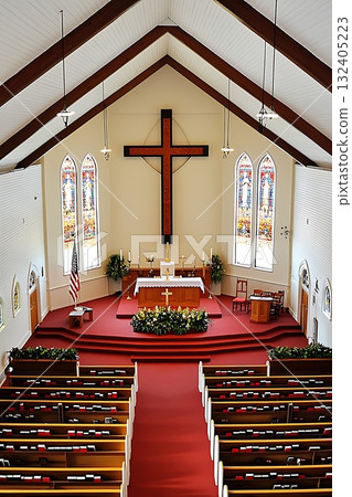 Church with a cross on the wall and a red carpet Church with a cross on the wall and a red carpet 132405223