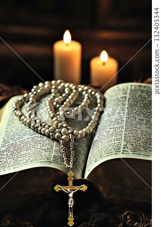 Cross is on a book with candles in the background Cross is on a book with candles in the background 132405344