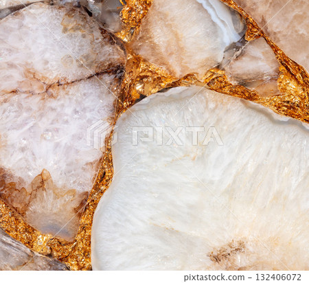 Agate Atena unique semi precious stone texture with a gold leaf. 132406072