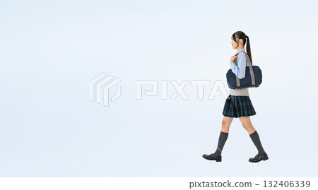 Full-body photo of a walking female student in uniform Full-body photo of a walking female student in uniform 132406339