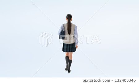Full-body photo of a walking female student in uniform 132406340