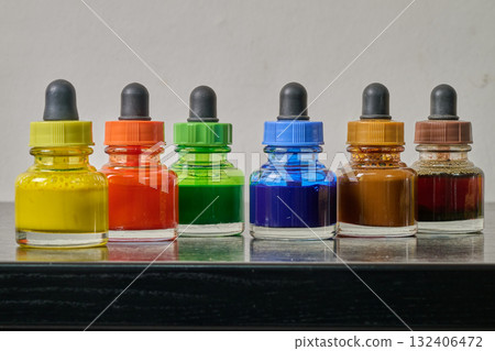watercolor paint pot on wooden plank watercolor paint pot on wooden plank 132406472