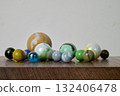 Marble game on wooden support 132406478