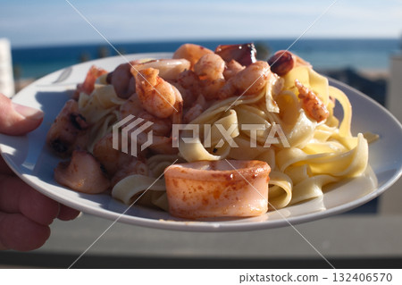 italian spaguetti pasta with nutritional carbohydrates 132406570