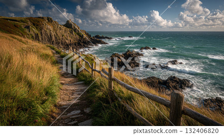 Coastal Cliff Path Overlooking Rocky Shore and Turquoise Sea Coastal Cliff Path Overlooking Rocky Shore and Turquoise Sea 132406820