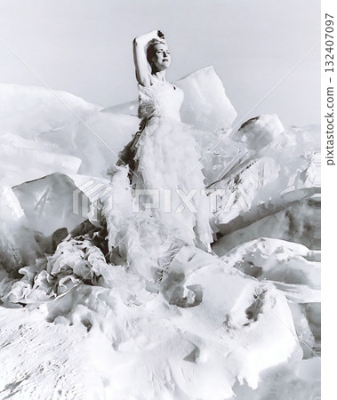 Snow Queen in a wedding dress poses on a mountain of ice and snow, symbolizing cold beauty. Snow Queen in a wedding dress poses on a mountain of ice and snow, symbolizing cold beauty. 132407097