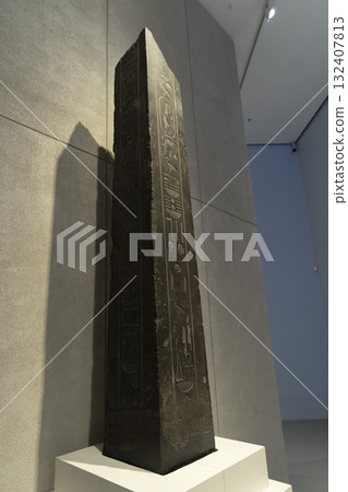 Melbourne, Australia - July 2, 2024 : Obelisk of Pharaoh Nectanebo II on display at the National Gallery of Victoria in Melbourne, Australia on July 2, 2024. 132407813