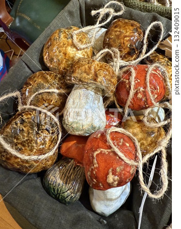 Autumn harvest theme featuring decorative pumpkins and squashes wrapped in rustic twine 132409015