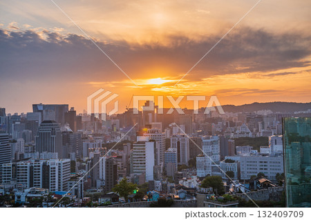 Seoul's Namsan Tower and its surrounding cityscape during the autumn day Seoul's Namsan Tower and its surrounding cityscape during the autumn day 132409709
