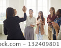 Happy women colleagues giving high five on meeting in office celebrating business achievement. 132409801