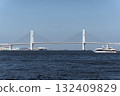 A sightseeing boat crossing the Yokohama Bay Bridge 132409829