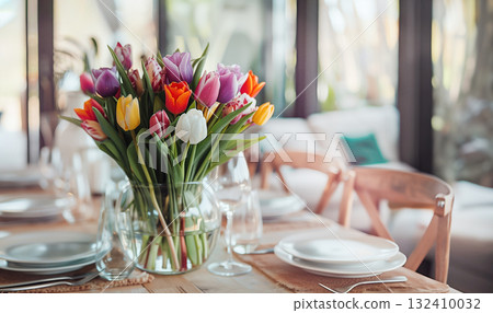 Easter concept. Glass vase bouquet pink yellow tulips, cradling pastel Easter eggs, set against modern grey backdrop. paste blank. Holidays, copy space, design greeting cards, art minimalist style 132410032