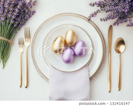 Luxury Happy Easter. Elegant top view, layout, minimalist style, Easter decorated table with golden eggs and lavender bouquet 132410147