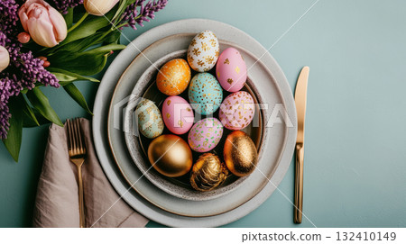 Happy Easter, banner Easter decorated table, blue table is plate with golden eggs, bouquet of various spring tulips, lily of valley flowers. 132410149