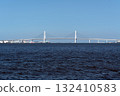 Yokohama Bay Bridge, a white bridge spanning the bay under a blue sky 132410583