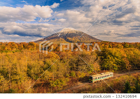 Mt. Yotei in Autumn Colors - A Train Journey Surrounded by Autumn Foliage 132410694