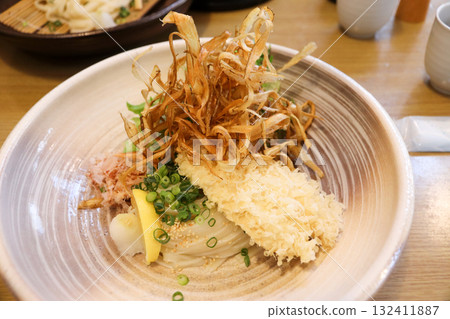 Homemade tofu and maitake mushroom tempura bukkake udon 132411887