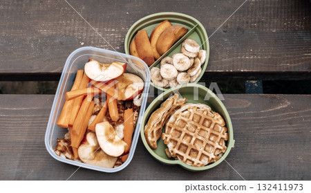 Healthy Kids Lunch Box Outdoors. Food snacks for children on the street. Healthy Kids Lunch Box Outdoors. Food snacks for children on the street. 132411973