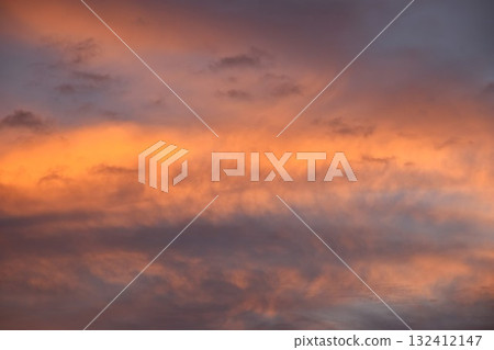 cloud spreading on orange twilight sunset sky in evening   132412147