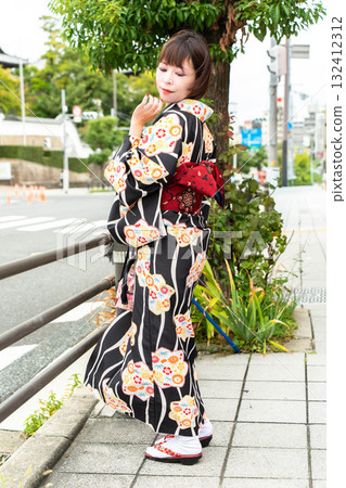 Japanese woman standing on Osaka Japanese woman standing on Osaka 132412312