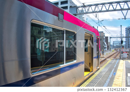 Keio Line Shinjuku-bound train at Fuchu Station. Keio 5000 series Keio Line Shinjuku-bound train. 132412367
