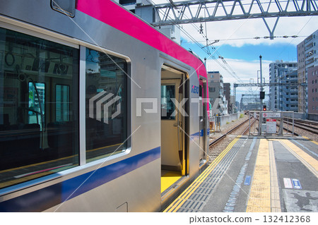 Keio Line Shinjuku-bound train at Fuchu Station. Keio 5000 series Keio Line Shinjuku-bound train. 132412368