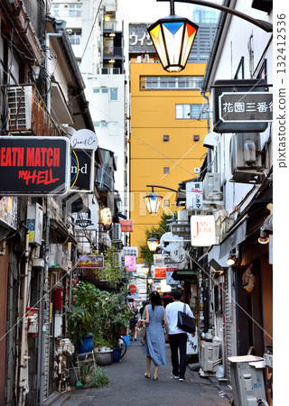 Shinjuku Golden Gai is sparsely populated by foreign tourists during the day Shinjuku Golden Gai is sparsely populated by foreign tourists during the day 132412536