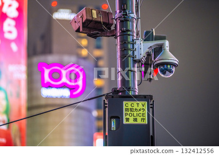 Tokyo cityscape in Japan - Security cameras on street corners. CCTV security cameras at Shibuya Scramble Crossing. POLICE Metropolitan Police Department 132412556