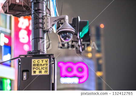 Tokyo cityscape in Japan - Security cameras on street corners. CCTV security cameras at Shibuya Scramble Crossing. POLICE Metropolitan Police Department 132412765