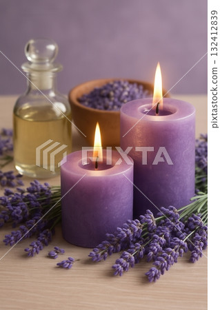 A calming arrangement of lavender flowers, candles and essential oil. A calming arrangement of lavender flowers, candles and essential oil. 132412839