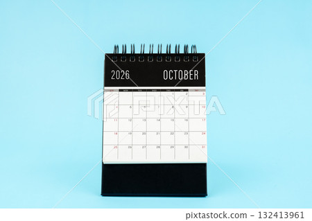 October 2026 Monthly desk calendar for 2026 year on blue background. October 2026 Monthly desk calendar for 2026 year on blue background. 132413961