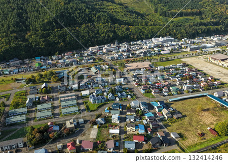 Aerial photograph of residential areas and riverside streets in Kasagi Town, Hokkaido 132414246