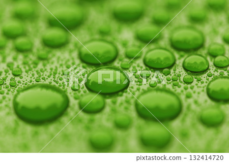 Closeup waterdrops on green ceramic coated paint surface 132414720