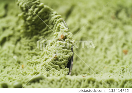 Close-up pistachio ice cream background scooping 132414725