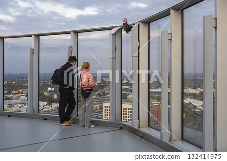 people look at the city of Cologne from the observation deck people look at the city of Cologne from the observation deck 132414975