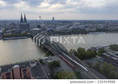 Evening view of Cologne Cathedral and Hohenzollern Bridge in the sunset 132414999