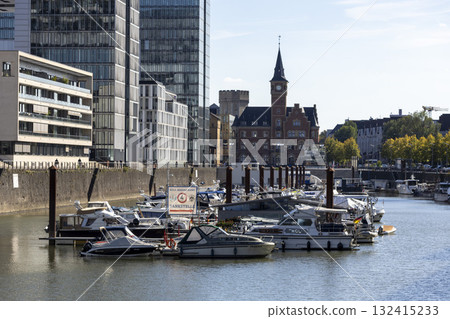 business center Kranhaus in Cologne and Boats at the pier 132415233