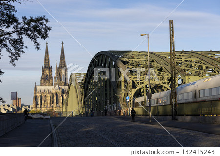 The train moves to the Cologne central station near the Hohenzollern bridge 132415243