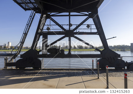 a part of Industrial gantry crane on the banks of the Rhine River a part of Industrial gantry crane on the banks of the Rhine River 132415263