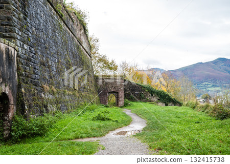 Surrounded by greenery and surrounded by a historic fortress in the rural town of Saint-Jean-Pied-de-Port in the French Basque Country Surrounded by greenery and surrounded by a historic fortress in the rural town of Saint-Jean-Pied-de-Port in the French Basque Country 132415738