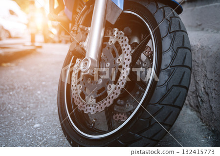 Motorcycle Wheel with Sunlight. Concept motorcycles Motorcycle Wheel with Sunlight. Concept motorcycles 132415773